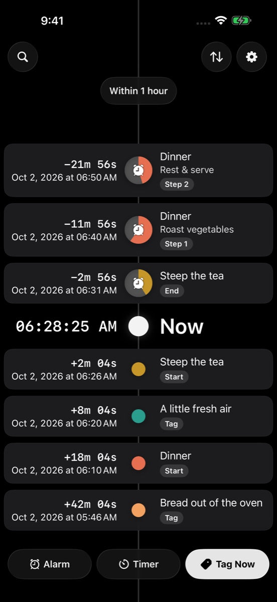 GOAT’s timeline in dark mode with warm timer wedges and a bright neutral Now node.