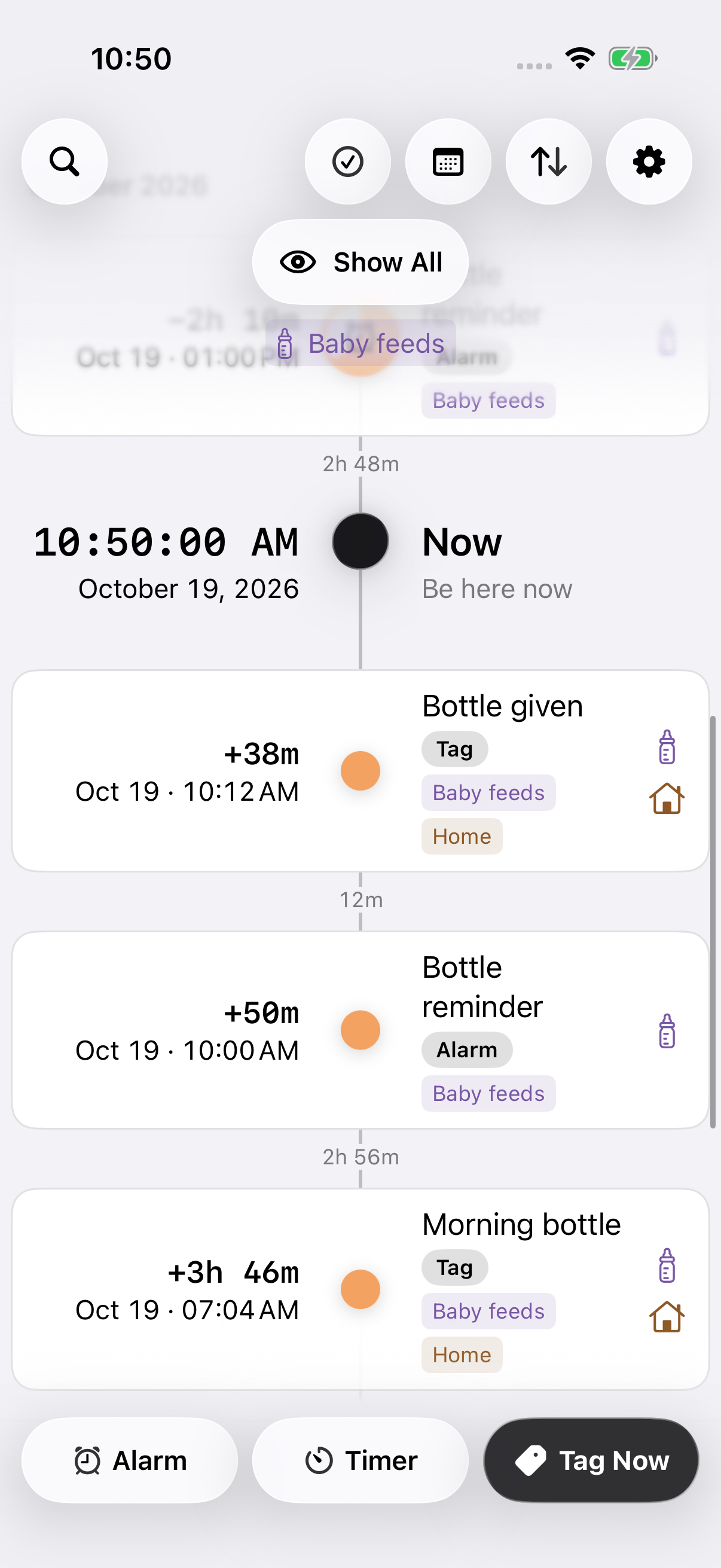 GOAT’s Baby feeds group showing Bottle reminder at 10:00 AM and Bottle given at 10:12 AM, 12 minutes apart. Bottle given also belongs to Home.
